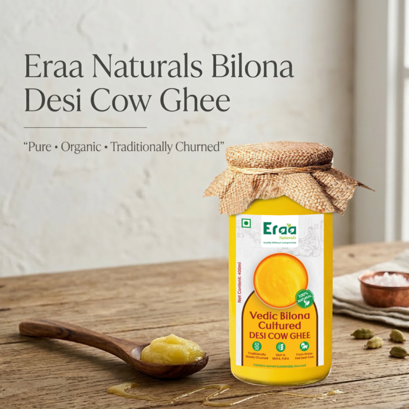 Eraa Naturals Bilona Desi Cow Ghee jar with wooden spoon and golden ghee